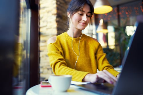 happy employee working in coffee shop