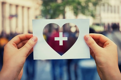 hands-holding-heart-wellbeing